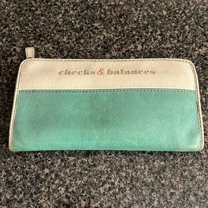 Real leather checks, and balances wallet